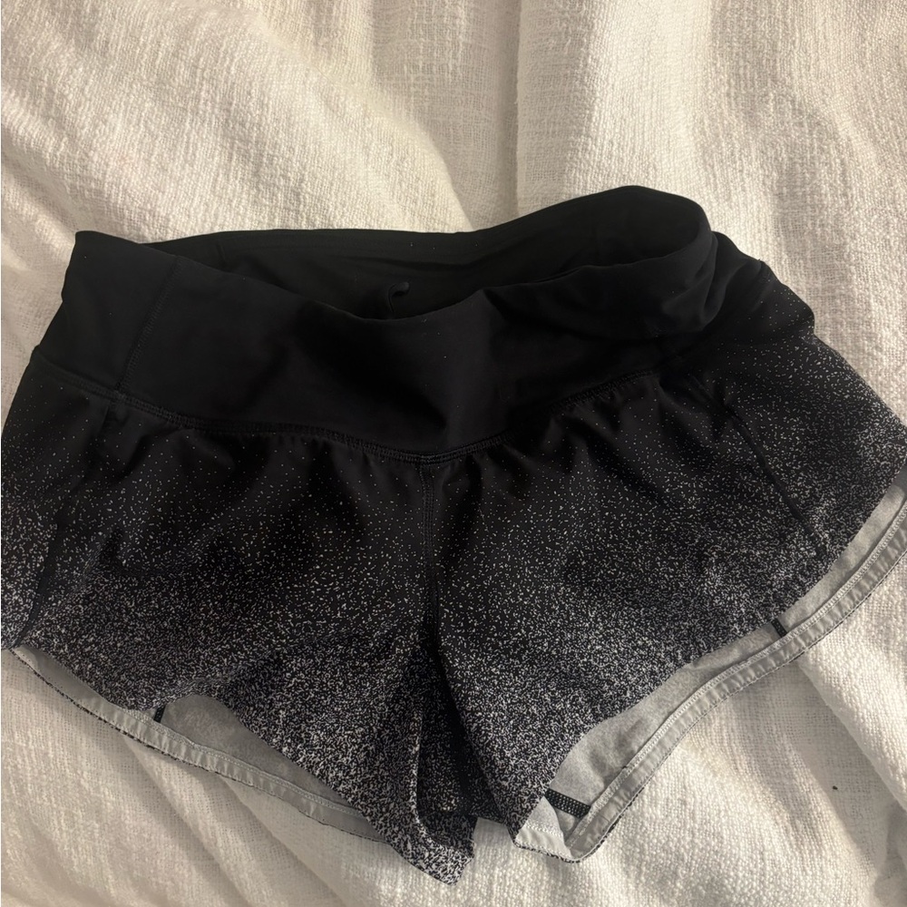 Lululemon speed up 2.5 inch black and grey shorts! Great and limited condition!